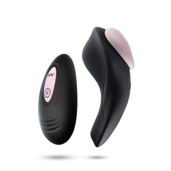 Introducing the Heartbeat Panty Vibrator with Remote Control by Blush: a sleek, black, curved handheld device featuring a pink circular pad, paired with an oval black remote adorned with a pink button. Both components are designed with smooth, ergonomic shapes and boast powerful vibrating functions. The remote control panty vibrator showcases intuitive icons for power and play/pause functionality.