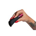 A hand with red-painted nails and a tattoo on the wrist holds the sleek Hot Octopuss Amo Powerful Silicone Bullet against a white background.