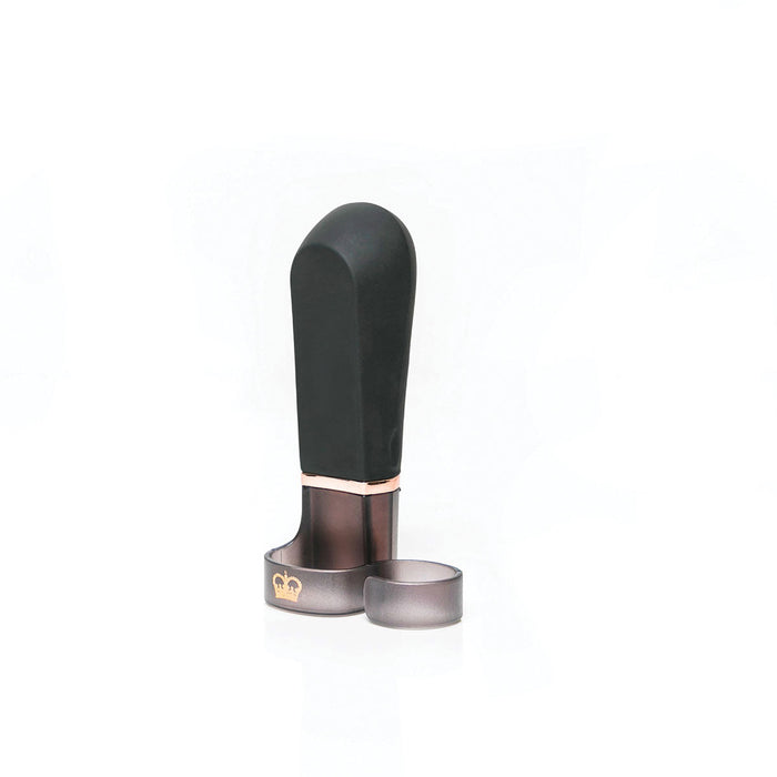 A uniquely designed product, the Hot Octopuss Digit Silicone Rechargeable Finger Vibrator features a sleek black handle made of premium silicone and a metallic base adorned with a small crown emblem. It stands upright against a plain white background, showcasing its modern aesthetics.