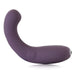 The Je Joue G-Kii Flexible Clitoral & G-Spot Vibrator - Purple by Je Joue is a seamless silicone personal massager with a curved design featuring a bulbous tip for targeted stimulation. This USB rechargeable massager tapers towards the other end, where there is a small metallic accent. The sleek design suggests ergonomic handling and comfort.