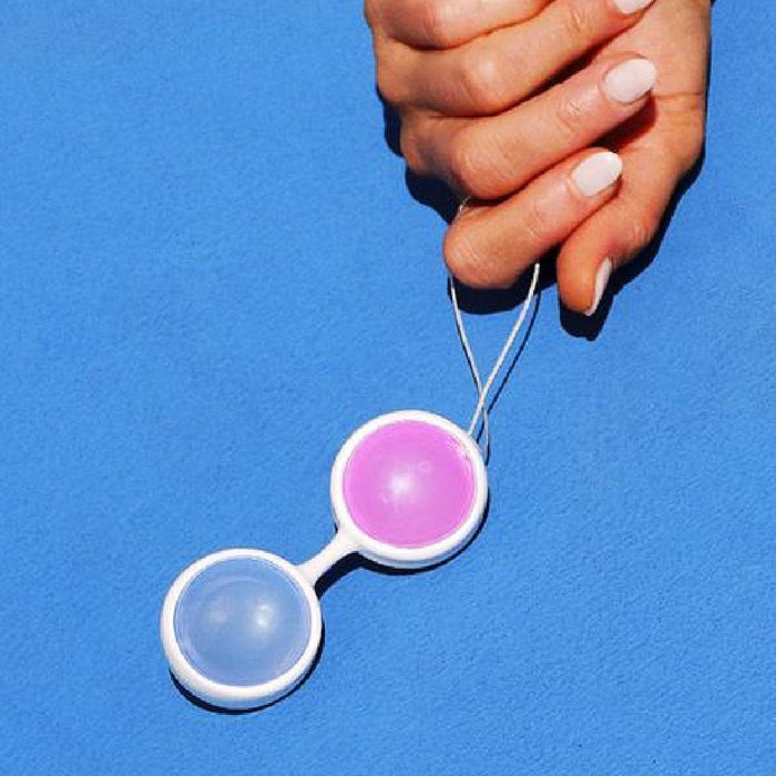 LELO Luna Beads Kegel Exercisers held in a hand