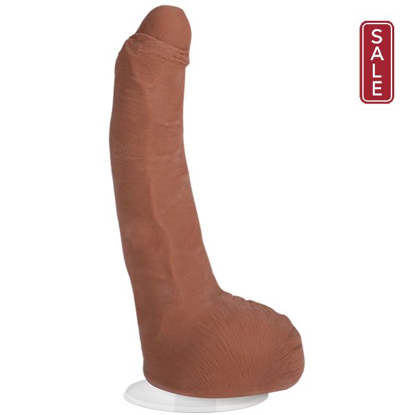 The Doc Johnson Leo Vice Uncut Vac U Lock Porn Star Dildo in Caramel is a realistic adult toy made from Ultraskyn material, designed to resemble a human penis. It stands upright on a Vac-U-Lock suction cup and features dual density construction with detailed anatomy and a veined texture for an authentic experience.