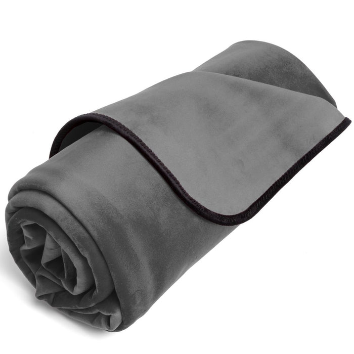 A rolled-up grey Liberator Fascinator Throw Mini Sized Velvety Sex Blanket with a black trim on a white background.