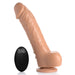 A caramel-colored, realistic-looking Loadz 8.5 Inch Vibrating Squirting Dildo from XR Brands, featuring a suction base, is positioned upright next to a black wireless remote control with buttons and the word "Loadz" inscribed on it. The toy flaunts detailed texture and offers 10 modes of vibration.