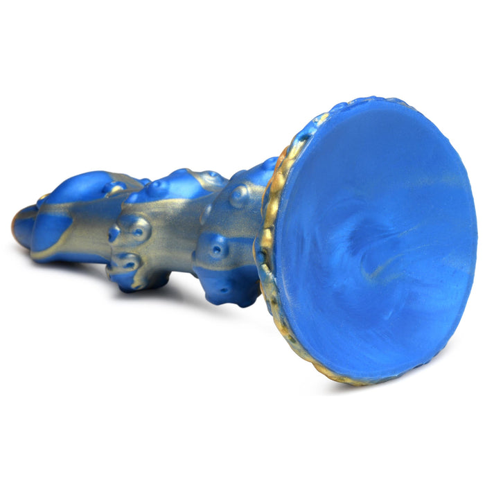 The Lord Kraken Blue and Gold 8.5 Inch Silicone Dildo by XR Brands is an intricately designed, artistic piece crafted from premium silicone. It features a textured surface, a raised, rounded end, various protrusions along its body, and includes a suction-cup base for added versatility.