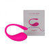 A bright pink, curved personal massager is displayed in front of its packaging box. The box features an image of the product, the brand name "Lovense," and the full product name "Lovense Lush 3 Sound Activated Bluetooth Wearable Vibrator." Perfect for long-distance couples, this device ensures virtual pleasure play from any location.