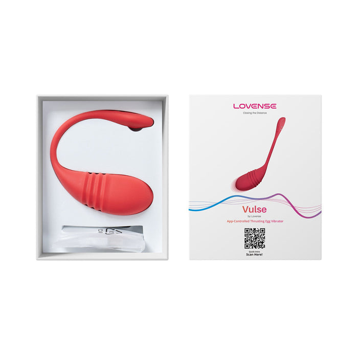 Image of a red Lovense Vulse Thrusting and Vibrating Egg in its box. Beside it is the product packaging displaying an image of the device, the brand name "Lovense," and the product name "Vulse Thrusting and Vibrating Egg" along with a QR code for seamless integration with the Lovense app for long-distance play.