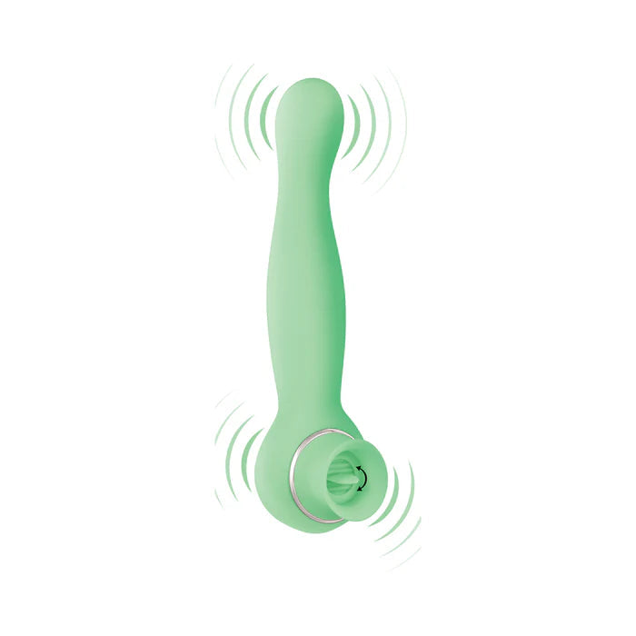 A mint green, silicone Luscious Licker Double Ended Licking & G-Spot Vibrator by Nasstoys with a curved design and a flared base is shown. The device has wavy lines emitting from the base and the tip, indicating vibration. This powerful vibrator is USB rechargeable and set against a plain white background.