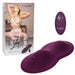 A display of the Lust Dual Rider Remote Control Humping Vibrator in purple from CalExotics, alongside its packaging featuring a model in white lingerie, posing with her arms behind her head. The hypoallergenic silicone vibrator has ribbed textures and three control buttons.