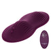 The Lust Dual Rider Remote Control Humping Vibrator, a purple textured silicone massager with an oval shape and two raised bumps, is accompanied by a matching purple waterproof wireless remote control labeled "CalExotics" with buttons. The vibrator features a ribbed design for added stimulation and includes dual motors for enhanced pleasure.