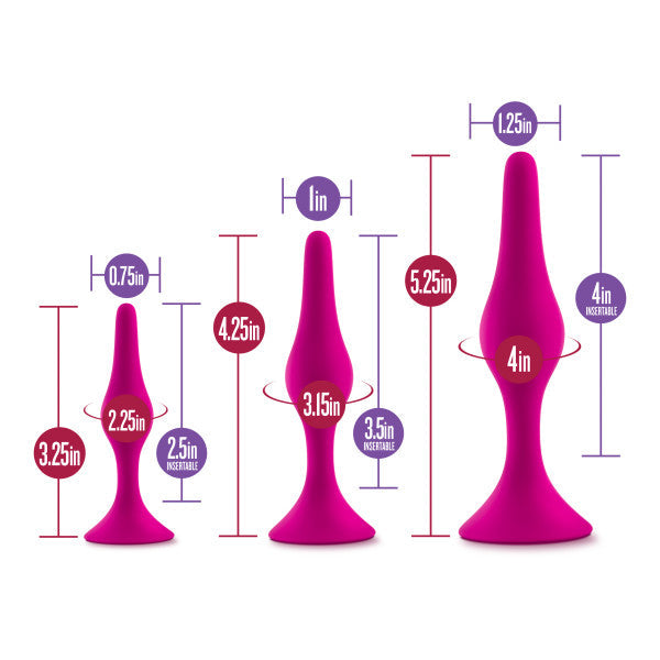 The Luxe Beginner 3 Plug Anal Trainer Set by Blush includes three differently sized butt plugs in a choice of colors, all made from body safe silicone. The smallest plug measures 3.25 inches in height and 0.75 inches in diameter, the medium one is 4.25 inches by 1 inch, and the largest stands at 5.25 inches with a diameter of 1.25 inches, each featuring tapered heads for ease of use.