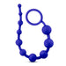 The Luxe Beginner Ultra Slim Silicone Anal Beads by Blush are crafted for a comfortable experience, featuring body-safe silicone beads that gradually increase in size. Available in various colors, including blue, these beads have a smooth, flexible texture and are connected with a circular handle at one end for easy use.