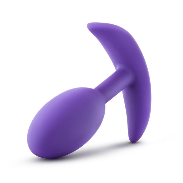 A Luxe Medium Wearable Silicone Vibra Slim Plug - Purple by Blush, featuring a T-shaped base for safe and comfortable insertion, showcased on a white background.