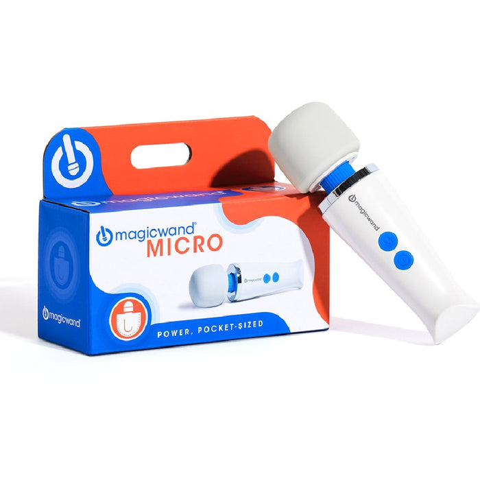 A compact white handheld massager with blue buttons, identified as the "Magic Wand Micro Rechargeable Cordless Vibrator" by Vibratex, is shown standing next to its packaging box. The box, designed with blue and orange colors, features an image of the mini wand along with the text "Magic Wand MICRO" and "POWER. POCKET-SIZED.