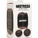 Mistress Mini Double Stroker Mouth & Pussy - Chocolate in packaging turned sideways to show textured inner walls on a white background