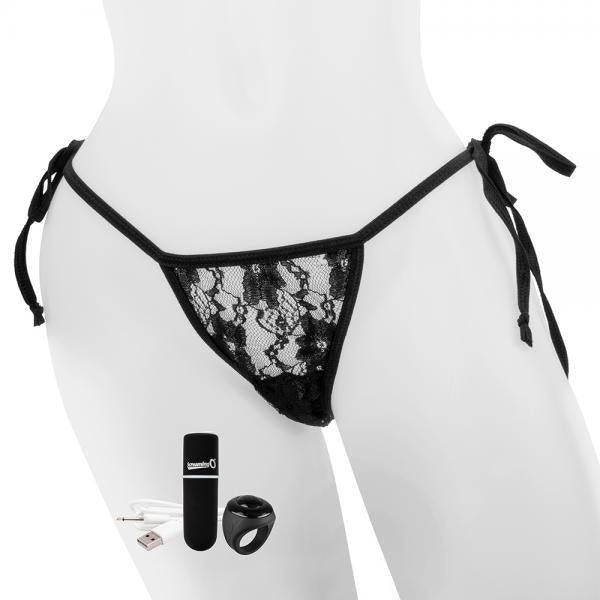 A mannequin is adorned in My Secret Remote Control One Size Vibrating Panties by Screaming O, featured in black lace with side ties. Nearby, a waterproof vibrator, USB charging cable, and wireless remote control are artistically displayed against a white background.