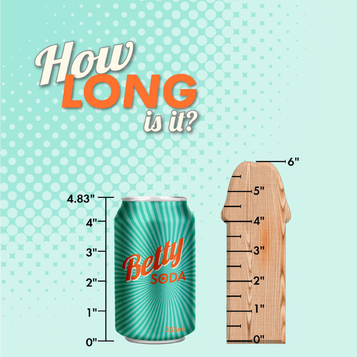 Image shows a green can of "Betty Soda" on the left, which measures approximately 4.83 inches tall, according to a scale marked at inch intervals. To the right of the can is a wooden ruler in the shape of a bottle, also marked at inch intervals from 1 to 6 inches. "How LONG is it?" is written at the top, reminiscent of measuring an item such as the Natural Realskin 6 Inch Squirting Dildo with Harness - Vanilla by Nasstoys.