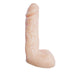 The Natural Realskin Squirting Dildo - 6 Inch in Vanilla by Nasstoys is a flesh-colored, realistic dildo featuring detailed textures such as veins and a prominent head. Made from flexible TPR material, it also has a curved base designed to resemble testicles, standing upright against a plain white background. It's perfect for cum play fantasies.