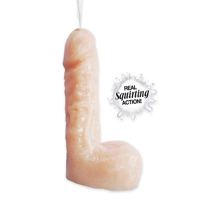 Introducing the Natural Realskin Squirting Dildo - 6 Inch - Vanilla by Nasstoys, a unique, novelty candle in the shape of a penis with a pale skin tone. This candle features squirt marks and boasts "REAL Squirting ACTION!" prominently displayed in a splash graphic. Perfect for cum play fantasies, it is suspended from the top by a string for an added touch of realism.