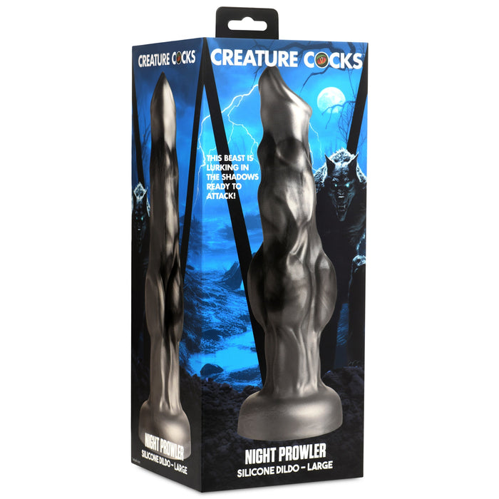 The image shows the packaging of a product called "Night Prowler 10 Inch Werewolf Canine Dildo with Knot" by XR Brands. This premium silicone werewolf dildo is large, black, and features a textured, sculptural design. The box has a dark, spooky theme with a creature's silhouette in the background.