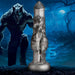 A monster-like humanoid creature stands with a menacing expression near a large, intricately shaped XR Brands' Night Prowler 6.75 Inch Werewolf Canine Dildo with Knot in the dark, eerie forest under a lightning-lit night sky with a full moon. The atmosphere is ominous and foreboding, highlighted by the glint of premium silicone reflections.