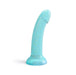 The Nightfall Teal Glitter 7 inch Silicone Dildo by Lovely Planet features a curved shape and playful yellow star patterns along its length, making it perfect for prostate or g-spot play. This glittery toy, with a flared base for safe use, stands upright against a plain white background.