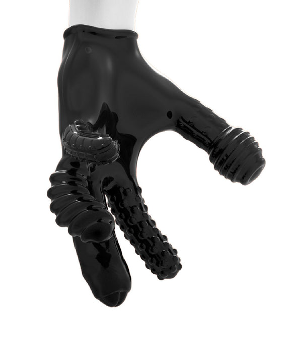 A close-up of a black, glossy Oxballs Finger Fuck Textured Fingering Glove - Black with unique textures. The thumb has a coiled texture, the index finger features a dotted texture, and the middle finger boasts a ribbed pattern. This flexible rubbery glove is showcased against a pristine white background.