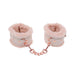 Explore the sophistication of Sportsheets' Peaches 'n Cream Fur Handcuffs. These pink fluffy handcuffs, connected by a rose gold chain, provide comfort with their soft padding and elegant design. The rose gold studs enhance this chic bondage accessory with a touch of elegance.