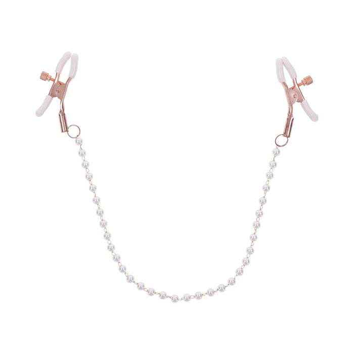 The Peaches 'n Cream Pearl Nipple Clamps by Sportsheets feature elegant nipple clamps in rose gold, linked by a string of pearl accents. Each clamp is carefully crafted with white rubber tips to enhance grip, combining both functionality and decorative appeal.