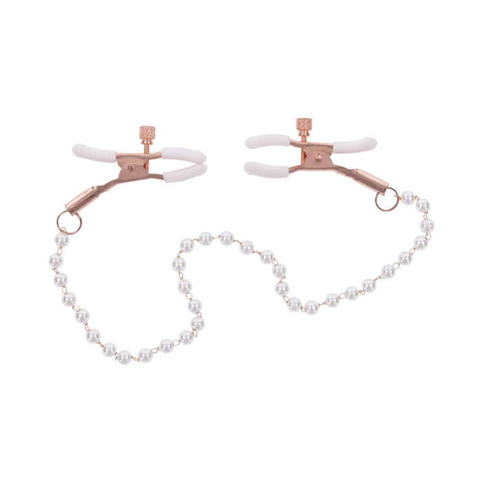 Introducing Peaches 'n Cream Pearl Nipple Clamps by Sportsheets: exquisite rose gold clamps featuring pearl accents, linked by a delicate strand of small, white faux pearls. Each clamp is crafted with precision for perfect pressure control, complete with adjustable screws and soft white rubber tips for comfort.