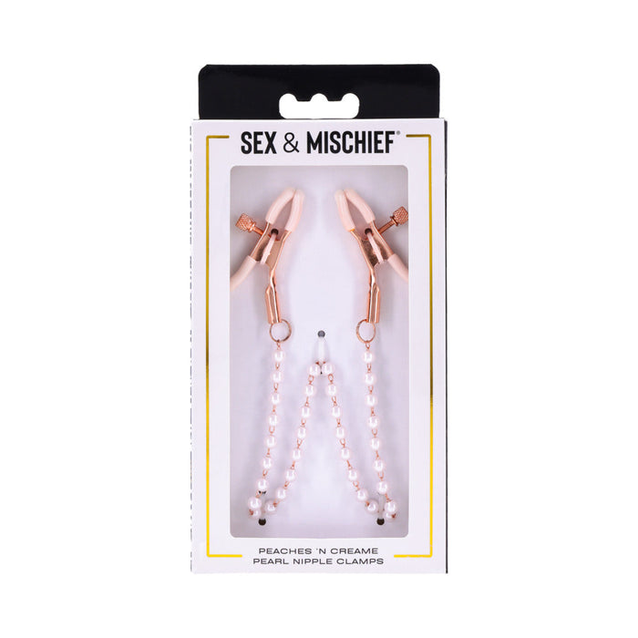 The packaging for Sportsheets' "Peaches 'n Cream Pearl Nipple Clamps" showcases rose gold clamps with a sleek black and white design, accented by delicate pearl chains.