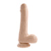 The Peek A Book Uncut Vibrating 8" Silicone Vanilla Dildo from Evolved Novelties stands upright on a flat surface. It features prominently detailed veins, a defined head, and a sturdy base for stability. The powerful suction cup base ensures hands-free use.