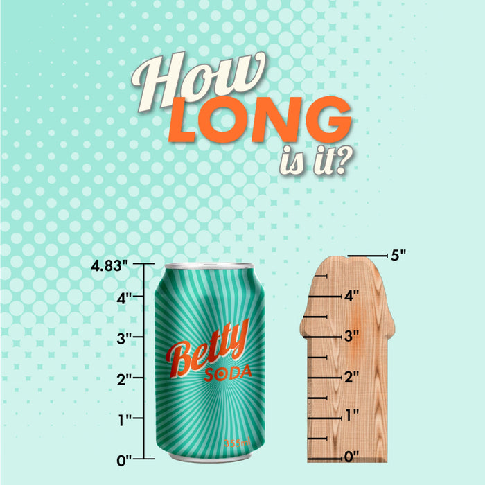 A mocha-colored, 5-inch Performance Packer soft packing dildo by Blush is next to a turquoise soda can with "Betty Soda" written on it. The wooden ruler beside the dildo has markings up to 5 inches, and above the image is text that reads, "How LONG is it? Get the measure of your performance packer.