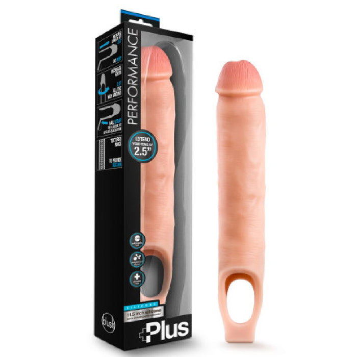 A packaged performance-enhancing adult product labeled "Performance Plus 11.5 Inch Silicone Penis Extender with Ball Strap - Vanilla" from the brand Blush. The image showcases the item, resembling a realistic human phallus with a soft skin tone and a hollow looped handle at the base. Made from body-safe materials and featuring realistic ribbing for added sensation, the packaging contains usage instructions and product information.