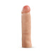 An image of the Blush Performance Plus 2 Inch Silicone Penis Extender, featuring realistic, beige-colored detail and a pinkish tip, stands upright against a plain white background.