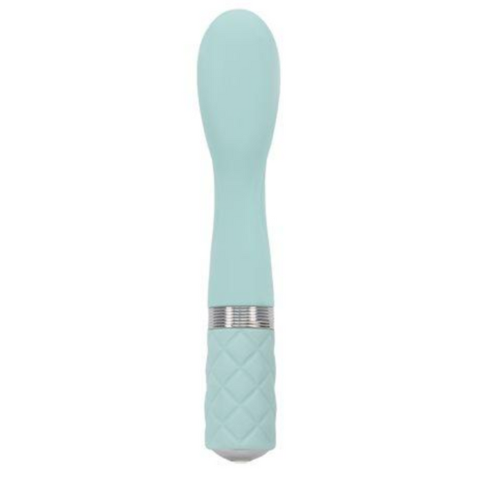 The image shows the teal-colored Pillow Talk Sassy G-spot Vibrator by BMS Enterprises. The upper part is smooth and elongated, while the lower part features a textured, quilted pattern for grip. A silver ring separates the smooth and textured sections. Made from premium silicone, its design is sleek and modern with powerful vibrations.