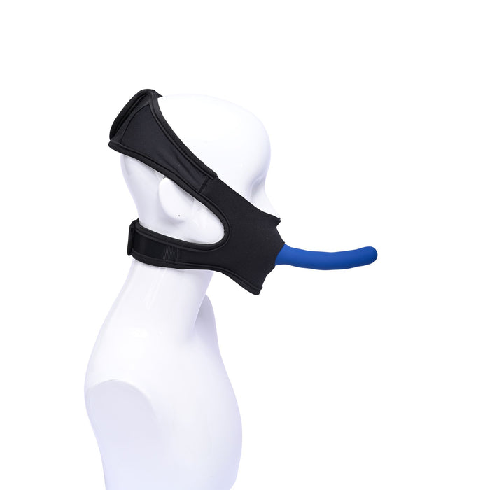 The Pivot Face Sitting Strap On Harness by Sportsheets is displayed on a white mannequin head, showcasing the black strap-on headgear with a blue piece extending from the mouth area. The device seems designed for medical or therapeutic use to support or adjust jaw and neck posture. The background is plain white.