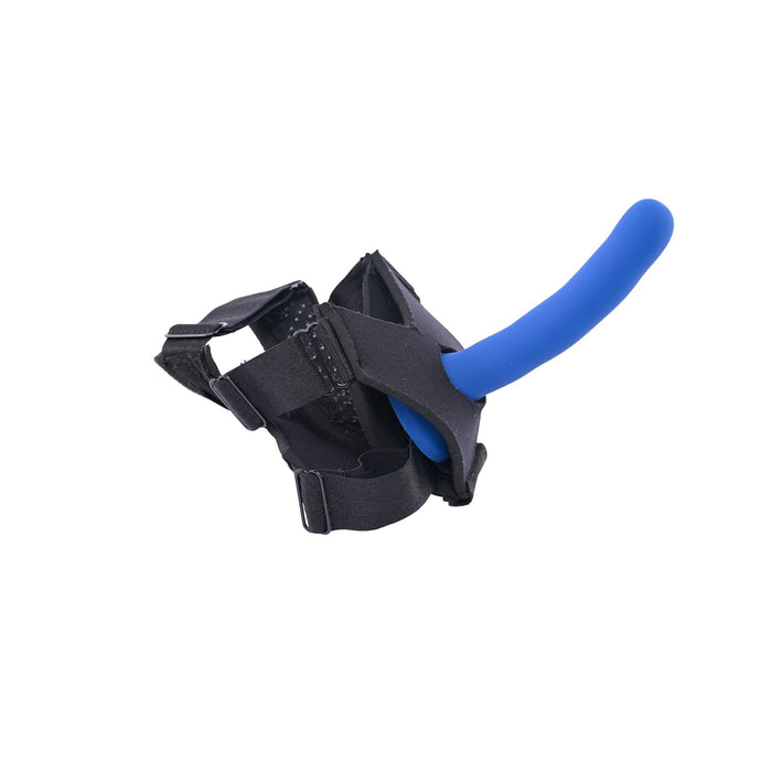 Introducing the Pivot Flex Foot and Ankle Strap On Harness by Sportsheets featuring a blue padded handle attached to a black harness with adjustable straps. The harness, constructed from sturdy fabric, includes a curved handle ergonomically designed for optimal grip, making it perfect for solo or couple play.