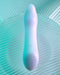 Playboy Euphoria G Spot Silicone Vibrator upright position on green background 