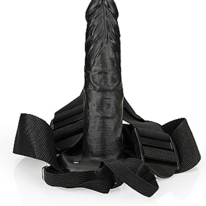 Entire Black Realrock 8 Inch Hollow Dildo & Strap-on Harness on a white background, standing vertically