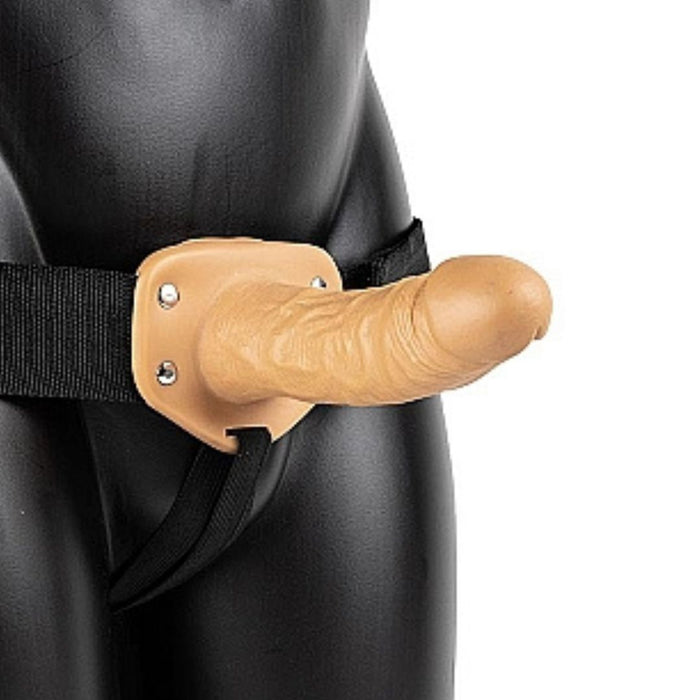 Realrock Vibrating 6 Inch Hollow Dildo & Strap-on Harness - Caramel on a mannequin on a white background