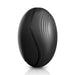 The Rim Joy Rimming Warming Tongue Vibrator by Pipedream Products features a sleek, black, oval-shaped design with a glossy finish and subtle curved lines on its surface, epitomizing modern elegance. It stands upright with a reflective base and boasts a waterproof design for versatile use.