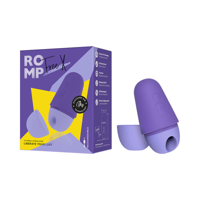 Image of a WOW Romp Free X Beginner's Pleasure Air Clitoral Stimulator with Lid in purple. The device, incorporating Pleasure Air Technology, is shown along with its packaging, which features a predominantly purple and yellow design. The packaging displays various features and the ROMP logo. The rechargeable stimulator is depicted with its detachable cap off.
