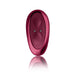 A sleek, red, oval-shaped electronic device from Rocks Off stands upright with a smooth, glossy finish. The Ruby Glow Blush External Grinding and G-Spot Vibrator with Remote features two small, round buttons near the center and a subtle indentation on the front for enhanced pleasure. A slight reflection is visible at the base.