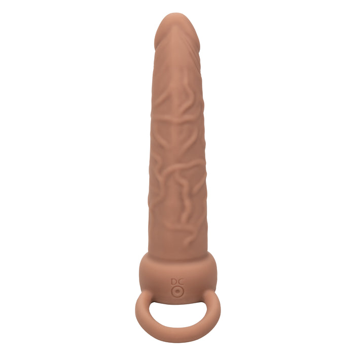 The Performance Maxx Double Penetration Vibrating Dildo in Light Chocolate is a silicone, phallic-shaped sex toy with textured detailing for enhanced anal exploration and a sturdy ring base.