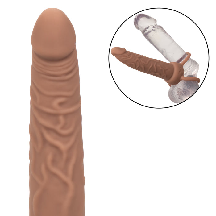 A close-up of the Performance Maxx Double Penetration Vibrating Dildo - Light Chocolate appears on the left. An inset in the top right corner shows a transparent suction cup base attached to a surface, highlighting its double penetration capability.