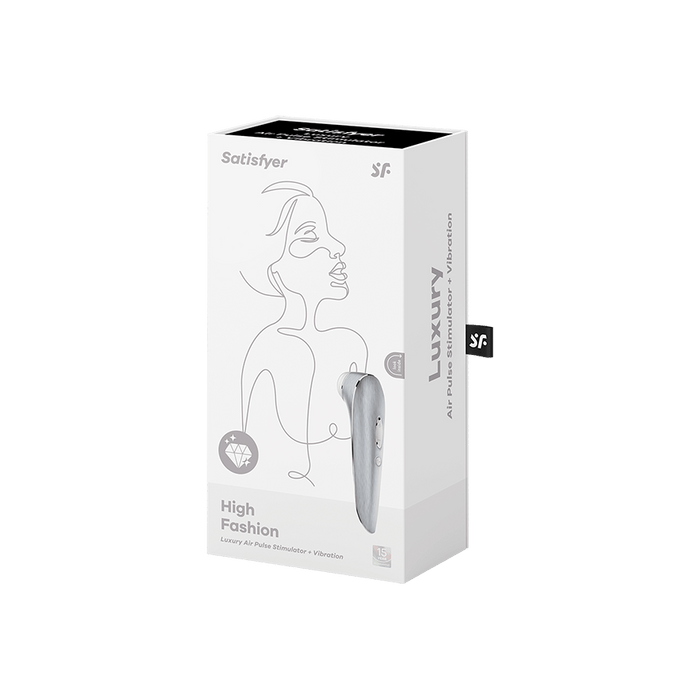 The packaging for the Satisfyer Luxury Air Pulsation + Vibration - Pure Aluminum showcases a line drawing of a woman alongside an image of the product. It emphasizes "Luxury Air Pulse Stimulator + Vibration" for unparalleled clitoral stimulation and features a sleek, minimalist design by Satisfyer.