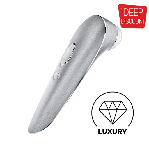 Introducing the Satisfyer Luxury Air Pulsation + Vibration - Pure Aluminum, a sleek and metallic handheld device designed for clitoral stimulation. Its streamlined design boasts a large plus button complemented by a smaller one below. The brushed metal finish adds both a modern and stylish aesthetic, offering an exquisite and sensual blend of pleasure that is synonymous with the Satisfyer brand.