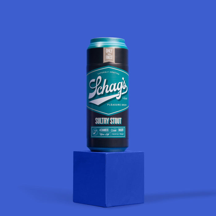 A can of Schag's Sultry Stout Self-Lubricating Penis Stroker stands on a blue pedestal against a solid blue background. The teal and black can features the Blush logo with "Sultry Stout" prominently displayed on the front, reminiscent of the ultra discreet design found in their Sultry Stout male masturbator series.