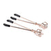 Sex And Mischief Brat Pearl Nipple Clips - Rose Gold laying sideways 